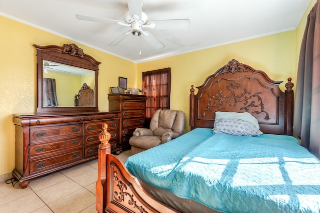 bedroom featuring light tile patterned floors, crown molding, and ceiling fan