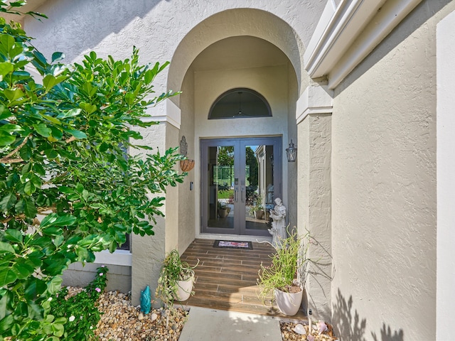 doorway to property featuring french doors