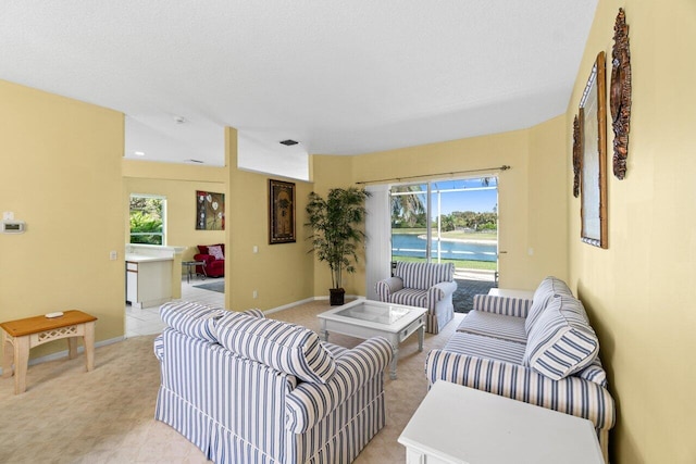 living room featuring visible vents and baseboards