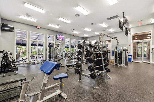 workout area with french doors and visible vents