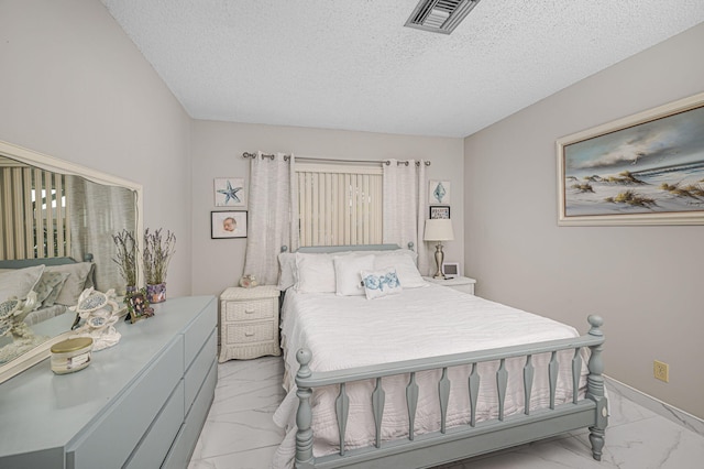 bedroom with a textured ceiling