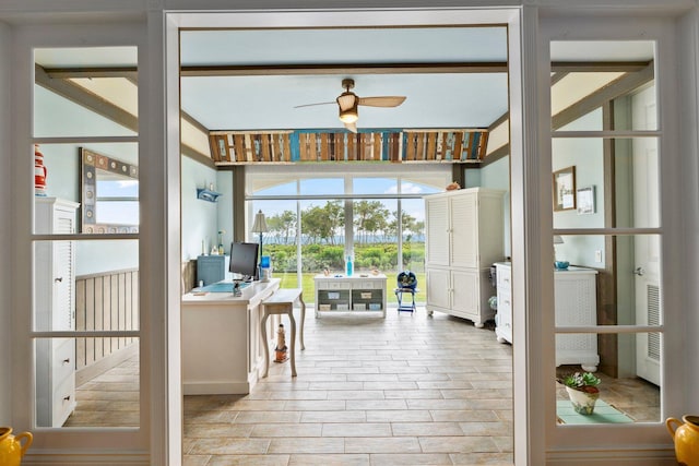 interior space featuring ceiling fan