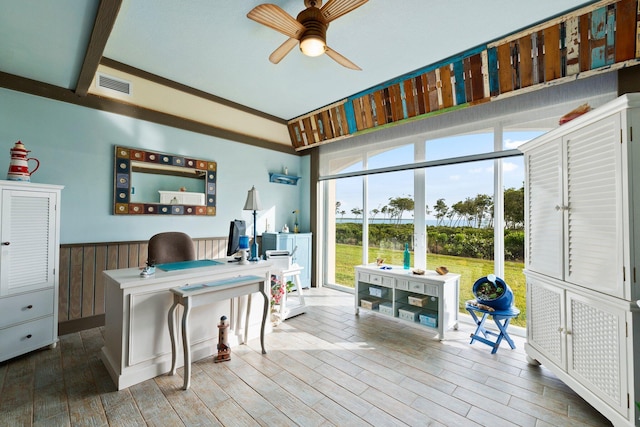 office featuring hardwood / wood-style floors and ceiling fan