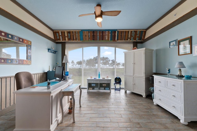 office space with ceiling fan