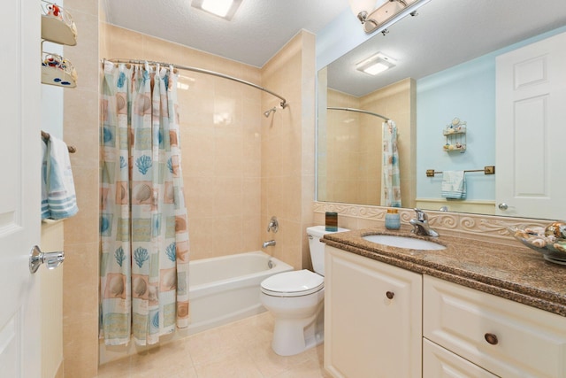 full bathroom with shower / tub combo with curtain, tile patterned flooring, vanity, a textured ceiling, and toilet