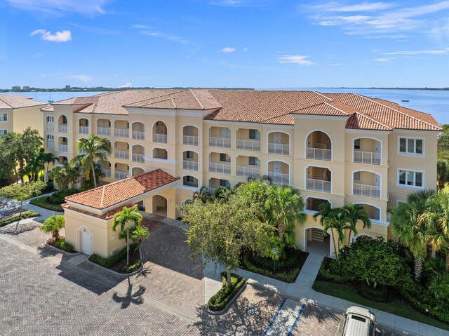 drone / aerial view with a water view