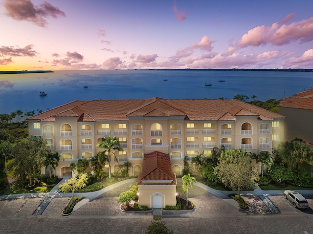 outdoor building at dusk with a water view