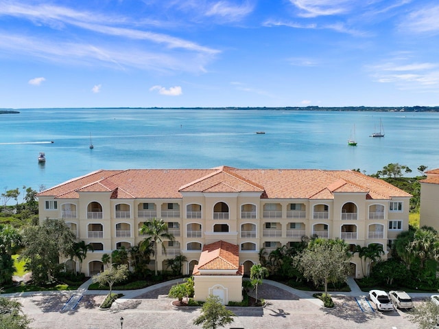 view of building exterior featuring a water view