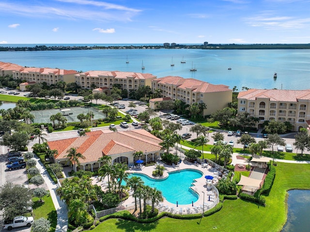 birds eye view of property featuring a water view