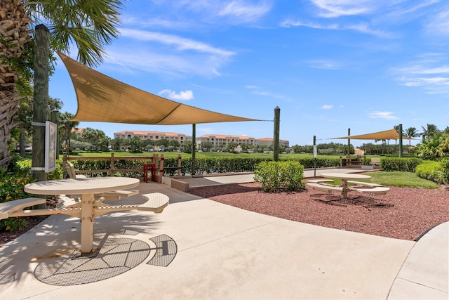 view of property's community featuring a patio