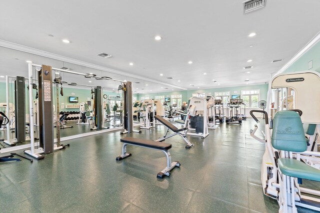 gym with ornamental molding