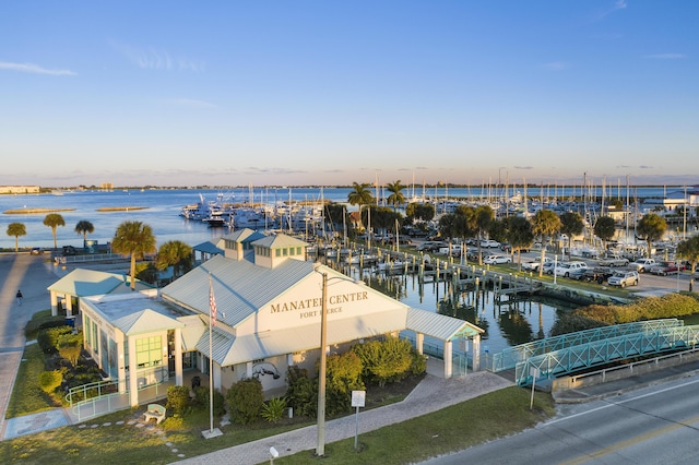 birds eye view of property featuring a water view