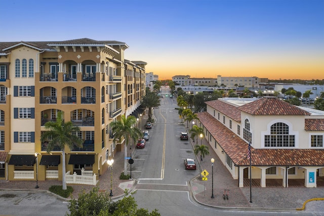 view of property with uncovered parking