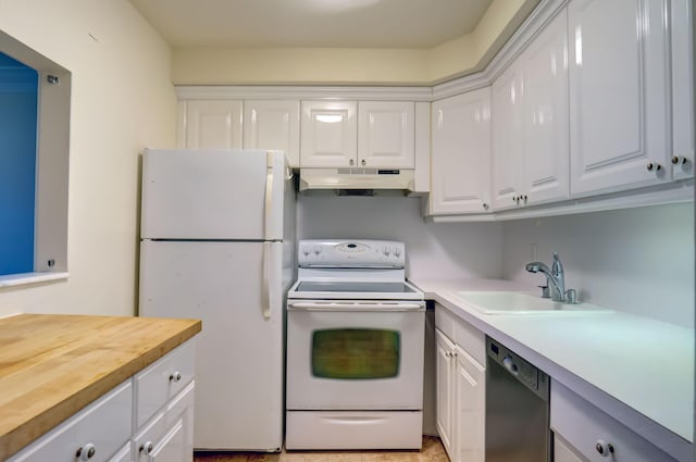 kitchen featuring wooden counters, sink, white cabinets, and white appliances