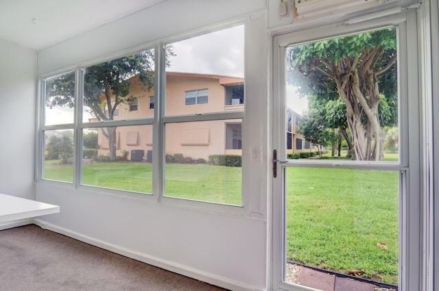 entryway featuring carpet floors