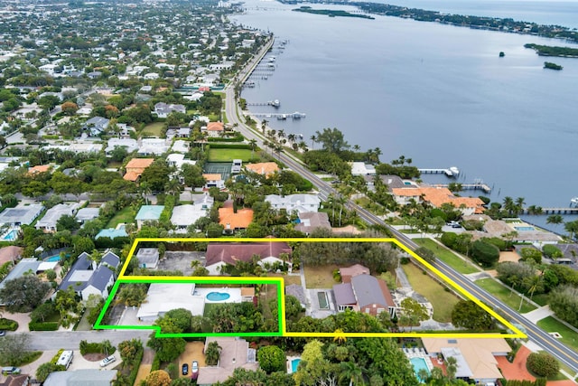 bird's eye view featuring a residential view and a water view