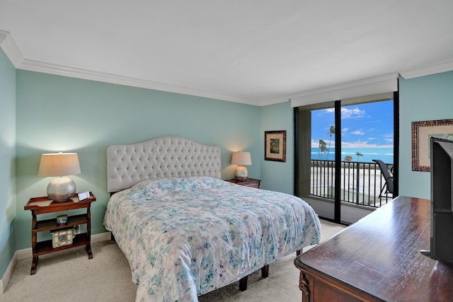 carpeted bedroom featuring access to outside and ornamental molding