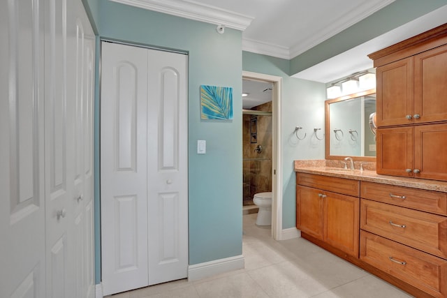 bathroom featuring toilet, an enclosed shower, ornamental molding, vanity, and tile patterned flooring