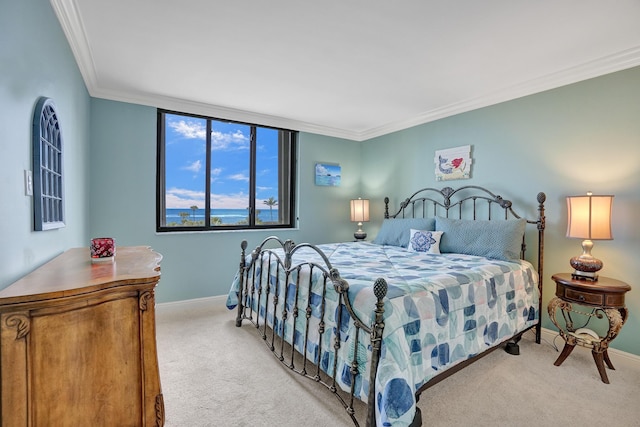 carpeted bedroom with crown molding