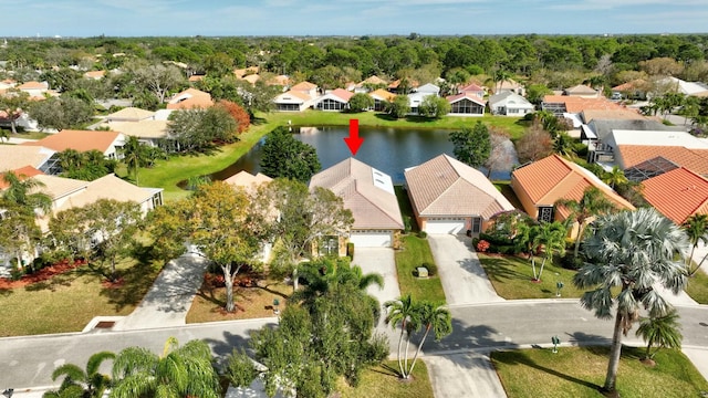 drone / aerial view featuring a water view