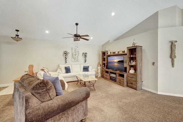 living room with ceiling fan, light colored carpet, lofted ceiling, and a textured ceiling