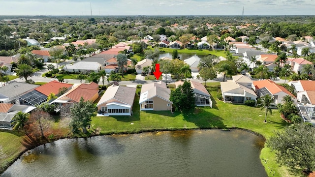 drone / aerial view with a water view