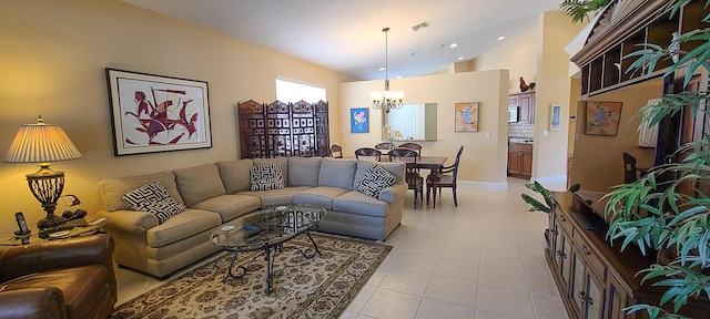 tiled living room featuring an inviting chandelier