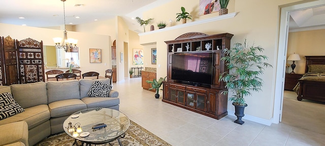 living room featuring light tile patterned floors and a chandelier