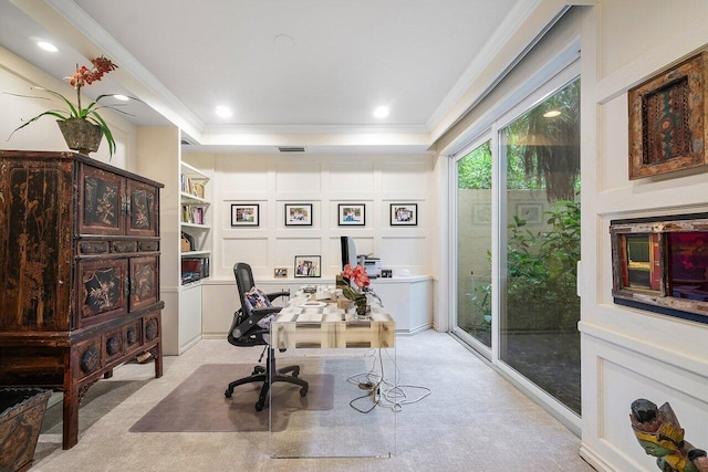 carpeted office featuring crown molding