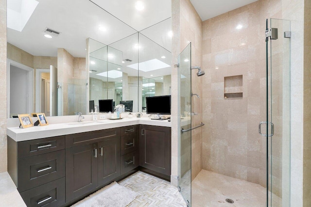 bathroom featuring vanity and walk in shower