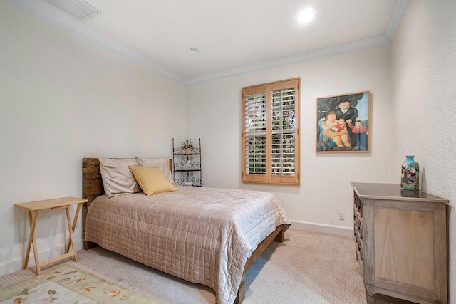 carpeted bedroom featuring crown molding