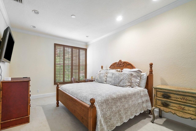 carpeted bedroom with ornamental molding