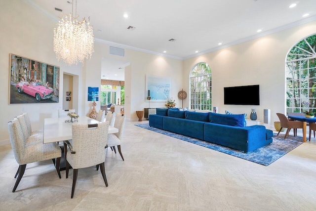 dining space featuring crown molding, a healthy amount of sunlight, and a chandelier