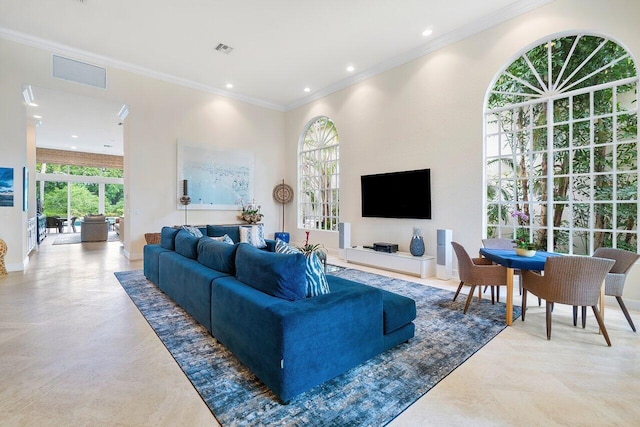 living room with ornamental molding