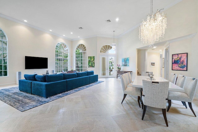 living room featuring a high ceiling, crown molding, a notable chandelier, and french doors