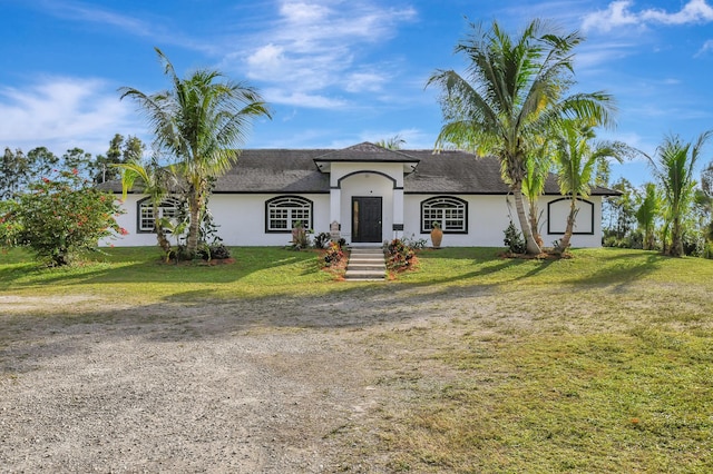 view of front of home featuring a front lawn