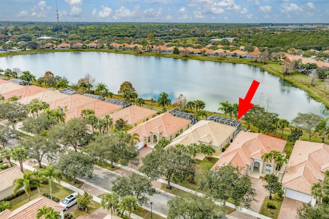 aerial view featuring a water view and a residential view