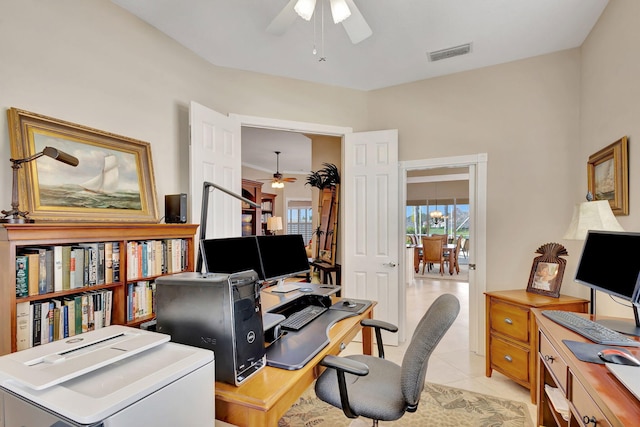 office space featuring light tile patterned flooring and ceiling fan