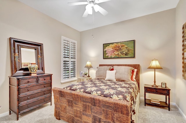 bedroom featuring carpet, baseboards, and a ceiling fan