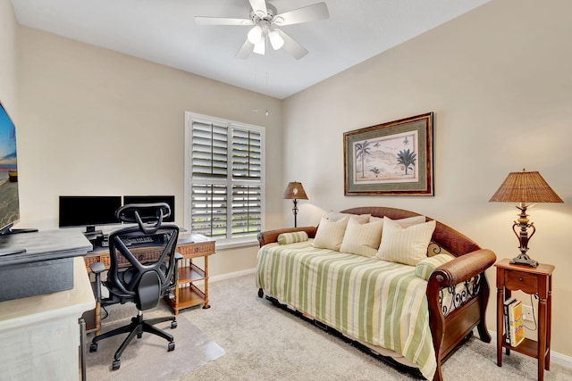 bedroom with ceiling fan and light colored carpet