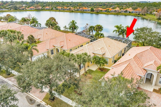 aerial view with a water view and a residential view