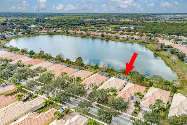 birds eye view of property featuring a water view