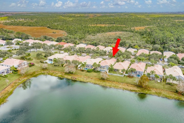 aerial view featuring a water view and a residential view