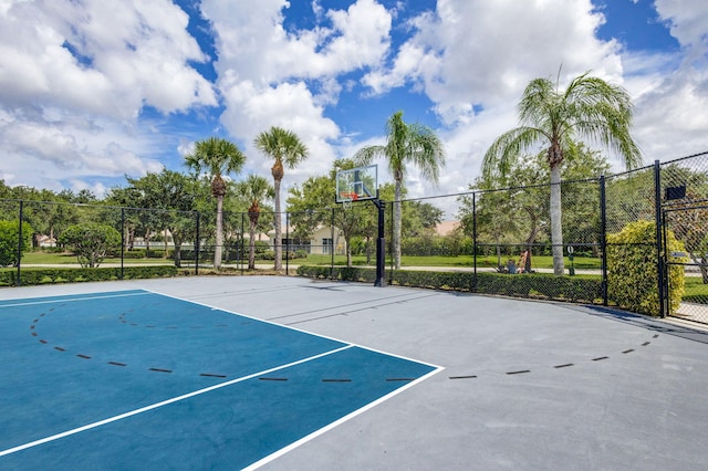 view of basketball court featuring community basketball court and fence