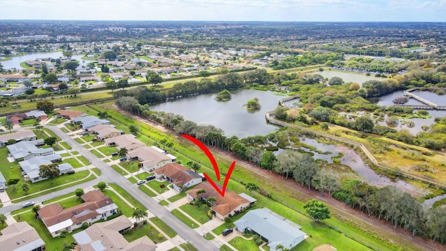 aerial view featuring a water view and a residential view