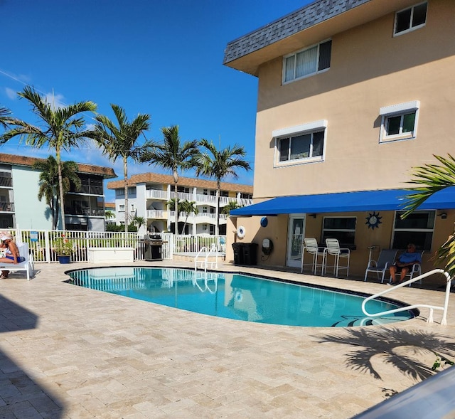 view of pool featuring a patio area