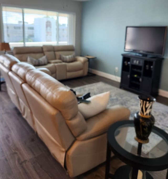 living room with dark wood-type flooring