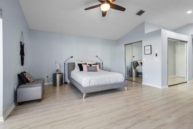 bedroom with lofted ceiling, ceiling fan, and light hardwood / wood-style flooring