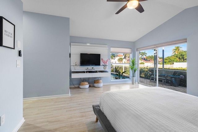 bedroom with light hardwood / wood-style flooring, access to outside, ceiling fan, and vaulted ceiling