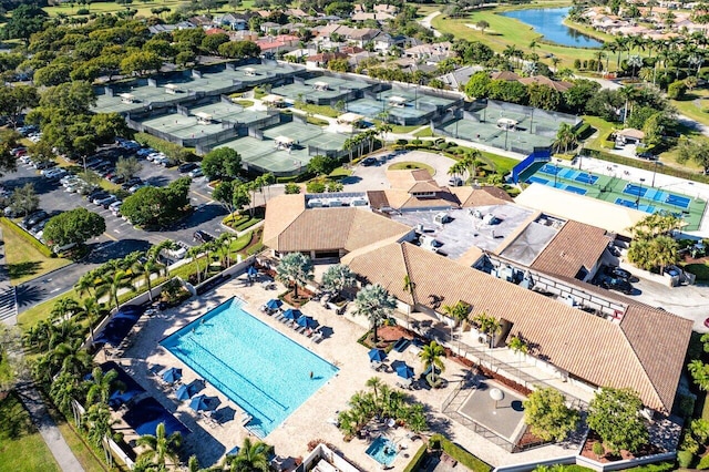 birds eye view of property featuring a water view